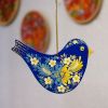 Елочная игрушка  с Петриковской росписью "Снегирь" синий с желтым